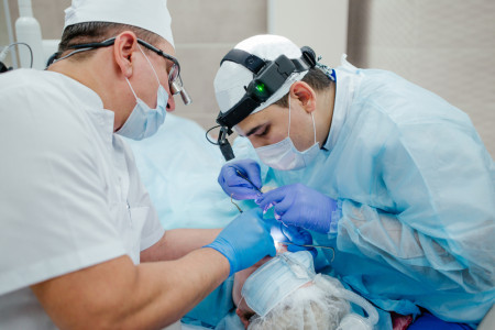 24 dentist doing surgery