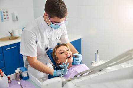 Dentist checking the patient