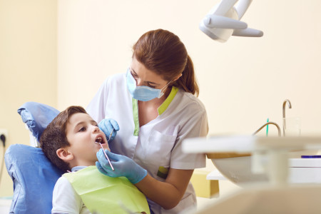 child with a dentist