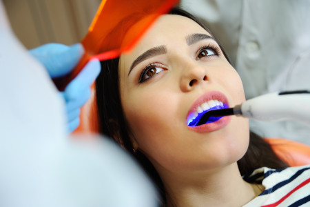 dentist performing a checkup