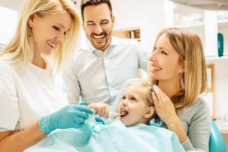 Dentist treating child