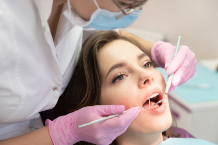 Doctor doing oral examination