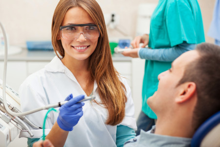 dentist examining in office