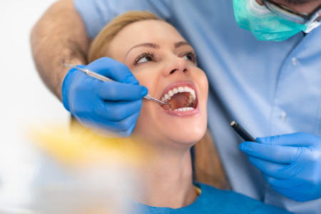 patient having treatment at dentist's office