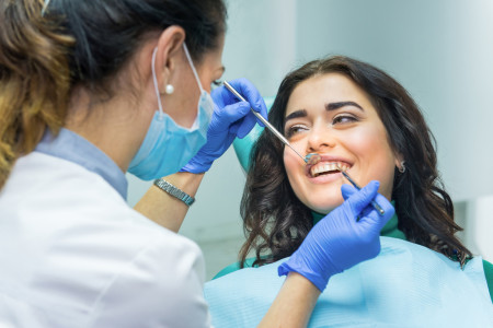 dentist checking the smile teeths
