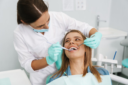 dentist fixing her teeth