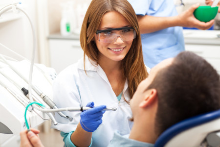 dentists examining a patient 247